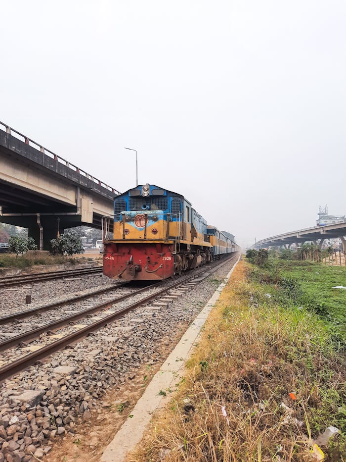 train-passing-under-bridge-in-dhaka-29420584 Train Engine